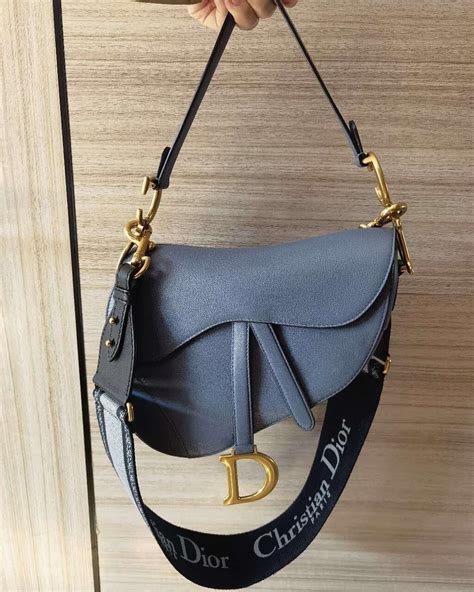 dior slim saddle pouch outfit|Dior saddle bag price increase.